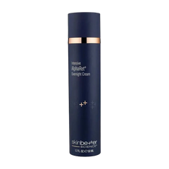 Blue skincare bottle with gold accents on a white background